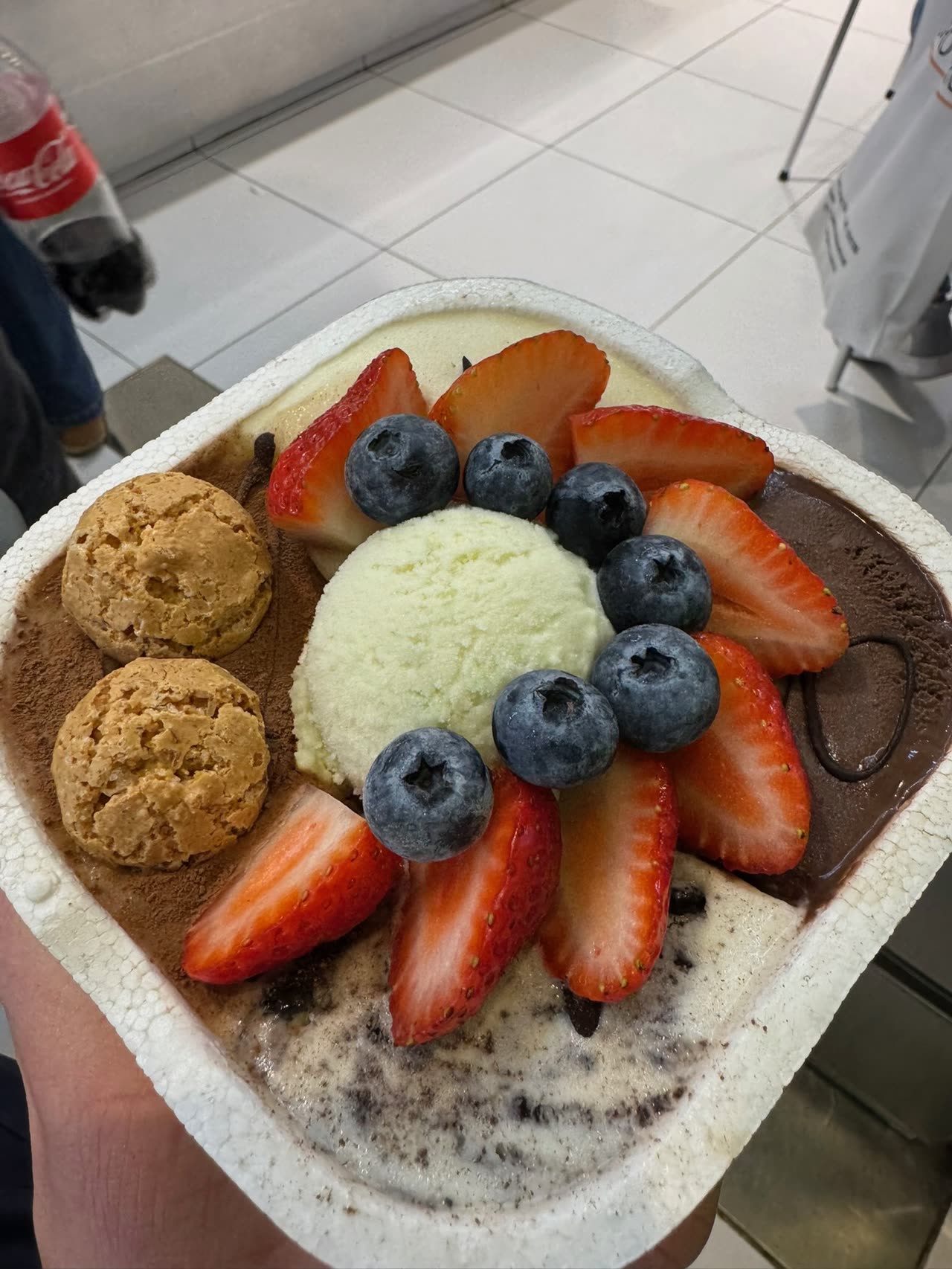 Dessert bowl with berries and ice cream