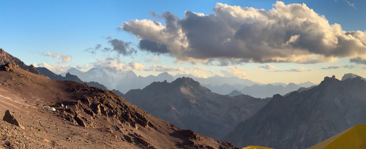 Panoramic twilight view of layered mountain ranges