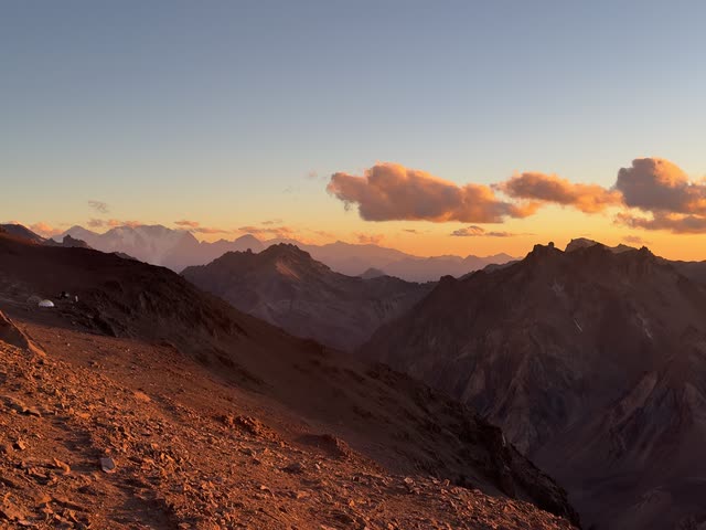 Mountain peaks during fiery sunset