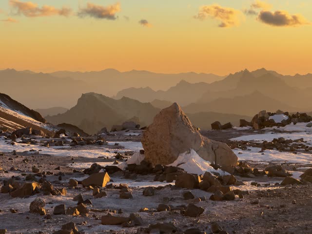 Looking down into a deep valley at sunset