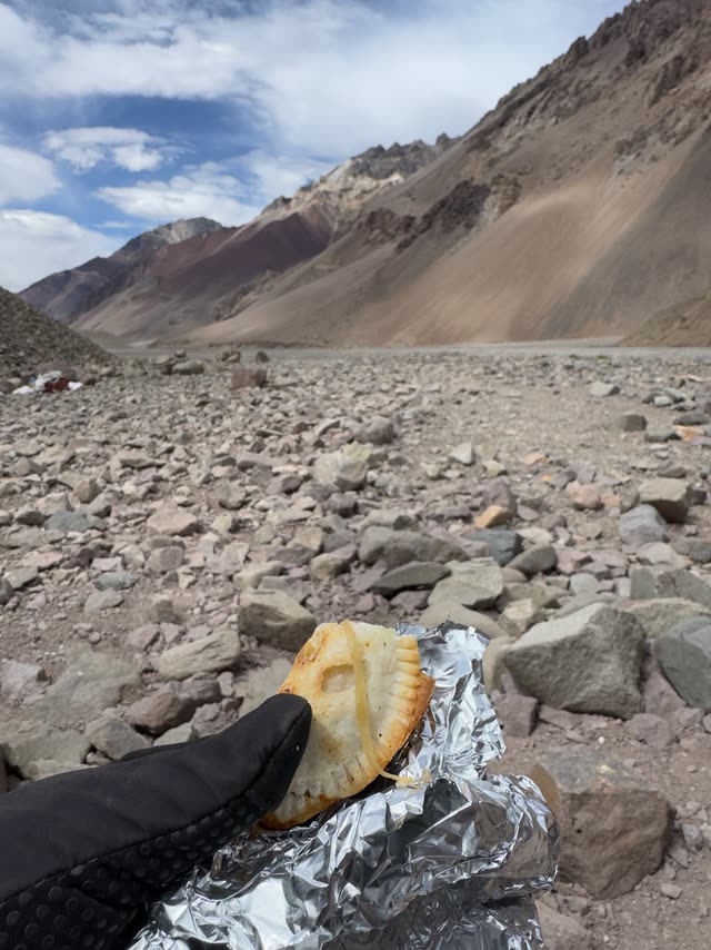 Hiker looking out over a massive deep valley