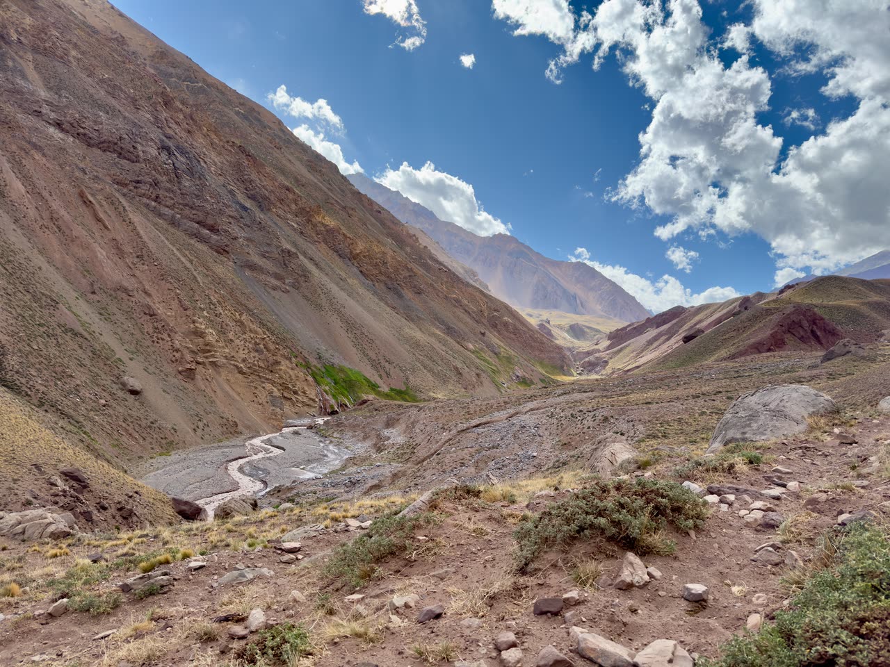 Wide rocky terrain with clear path winding through valley