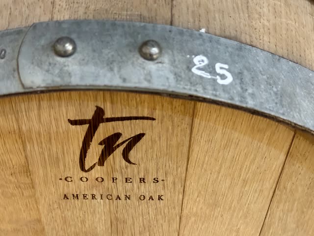 Wooden wine barrel with TN Coopers branding