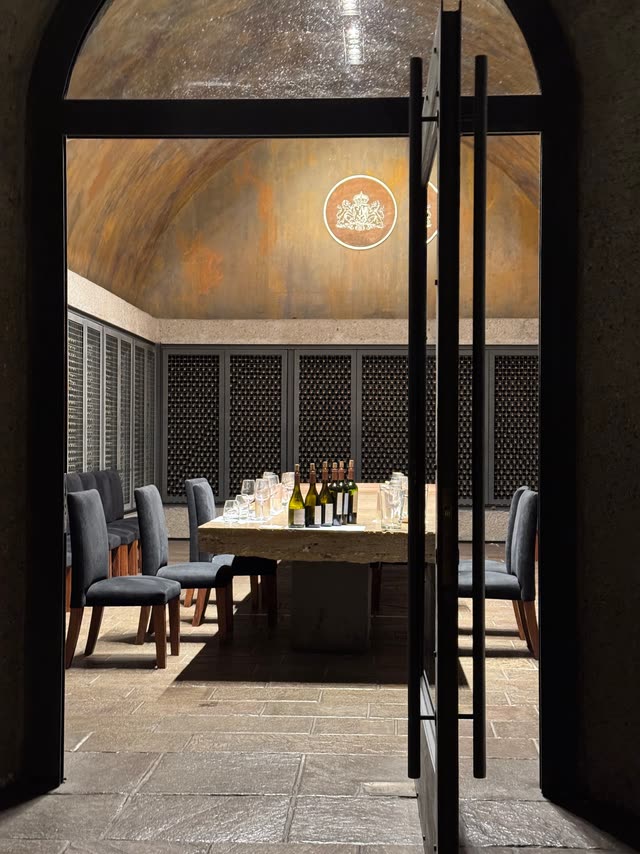 Tasting room table with glasses and bottles