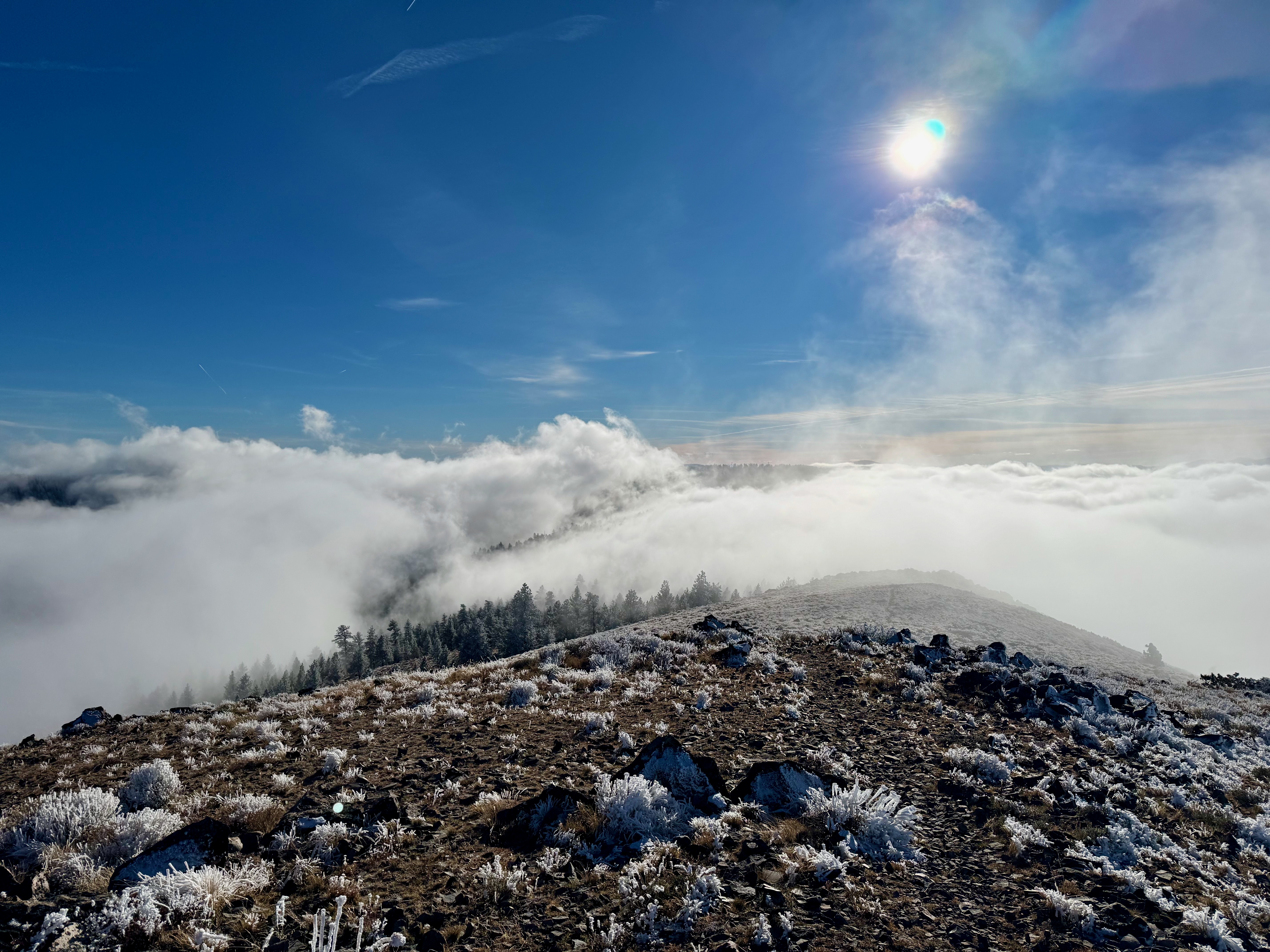 Summit ridge with clouds rolling through